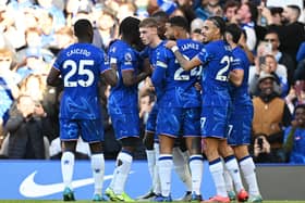 Cole Palmer of Chelsea celebrates with Moises Caicedo, Romeo Lavia, Reece James and Malo Gusto after scoring a goal which is later disallowed for offside after a VAR review during the Premier League match between Chelsea FC and Newcastle United FC at Stamford Bridge on October 27, 2024 in London, England. (Photo by Mike Hewitt/Getty Images)
