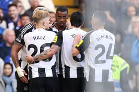 Alexander Isak of Newcastle United celebrates scoring his team's first goal with Lewis Hall, Jamaal Lascelles and Miguel Almiron during the Premier League match between Chelsea FC and Newcastle United FC at Stamford Bridge on October 27, 2024 in London, England. (Photo by Ryan Pierse/Getty Images)