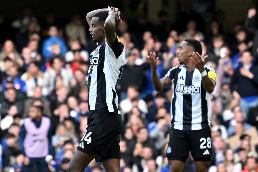 Alexander Isak and Joe Willock react after a missed opportunity during the English Premier League football match between Chelsea and Newcastle United at Stamford Bridge in London on October 27, 2024.