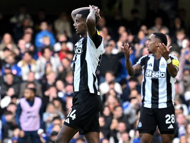 Alexander Isak and Joe Willock react after a missed opportunity during the English Premier League football match between Chelsea and Newcastle United at Stamford Bridge in London on October 27, 2024.