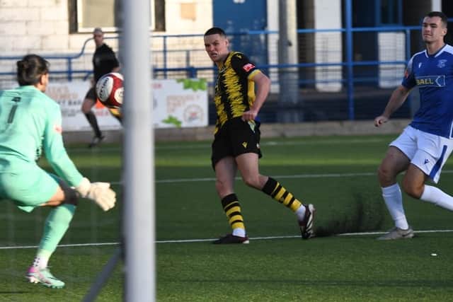 Olly Martin scores an equaliser as Hebburn Town battle to a draw at Leek Town (photo Tyler Lopes)