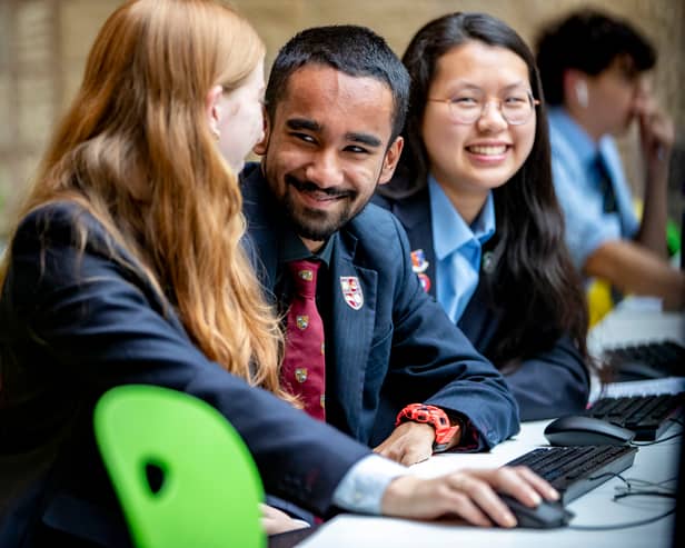 Zinedine Meah (centre) is one of the students who has been awarded an assisted place at Bradford Grammar School