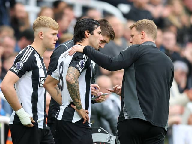 Newcastle United midfielder Sandro Tonali alongside Eddie Howe