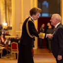 Harry Wilson, the founder of South Shields-based UK Docks, receiving his MBE from Princess Anne.