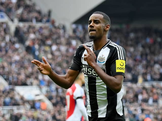 Alexander Isak celebrates scoring against Arsenal. 