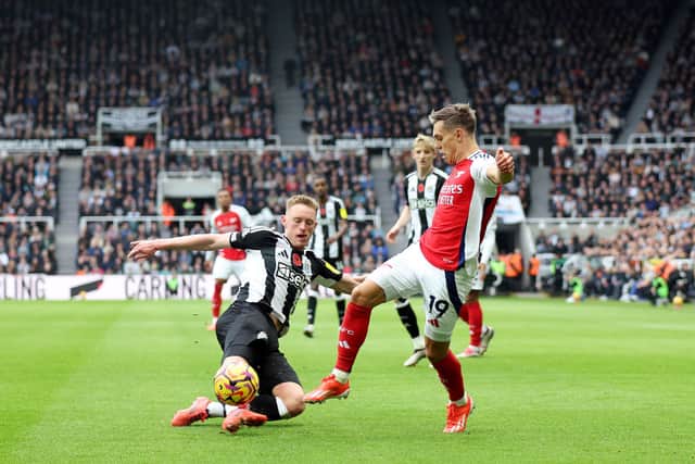 Sean Longstaff in action against Arsenal. 