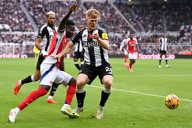 Lewis Hall in action against Arsenal.
