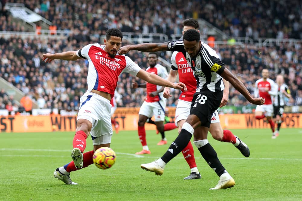 Joe Willock in action for Newcastle United against Arsenal.