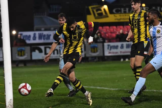 Amar Purewal scores for Hebburn Town in their 2-0 home win against Prescot Cables (credit Tyler Lopes)
