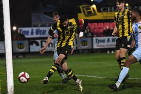 Amar Purewal scores for Hebburn Town in their 2-0 home win against Prescot Cables (credit Tyler Lopes)