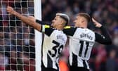 Bruno Guimaraes and Harvey Barnes celebrating for Newcastle United. 