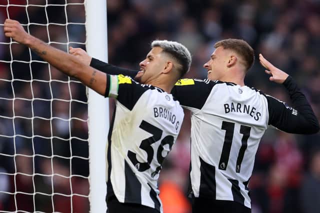 Harvey Barnes celebrates scoring for Newcastle United at Nottingham Forest.