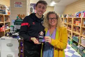 Sunderland AFC captain Dan Neil with Angie Comerford, the co-founder of Hebburn Helps.
