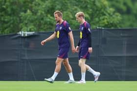Harry Kane and Anthony Gordon of England look on during an England Training Session at Spa & Golf Resort Weimarer Land on June 27, 2024 in Blankenhain, Germany. (Photo by Richard Pelham/Getty Images)