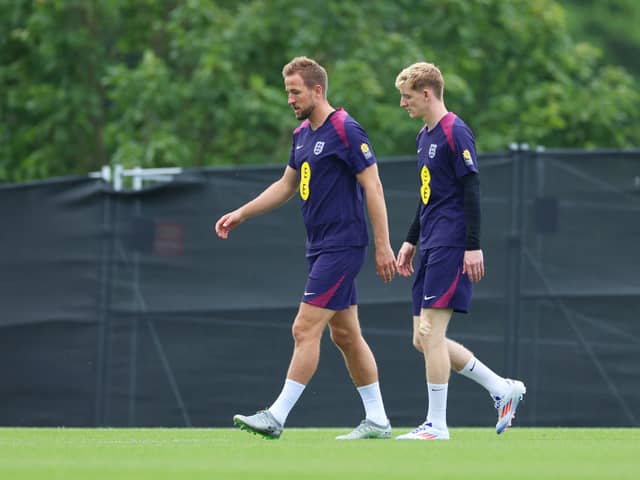 Harry Kane and Anthony Gordon of England look on during an England Training Session at Spa & Golf Resort Weimarer Land on June 27, 2024 in Blankenhain, Germany. (Photo by Richard Pelham/Getty Images)