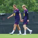 Harry Kane and Anthony Gordon of England look on during an England Training Session at Spa & Golf Resort Weimarer Land on June 27, 2024 in Blankenhain, Germany. (Photo by Richard Pelham/Getty Images)