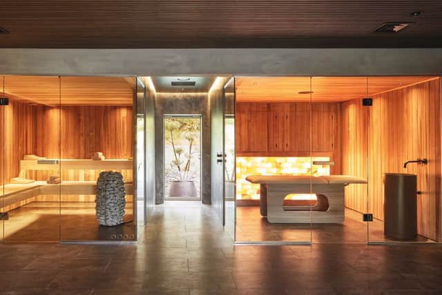 The spa features a sauna and treatment room, and it adjoins the gym, which opens out on to a hot tub