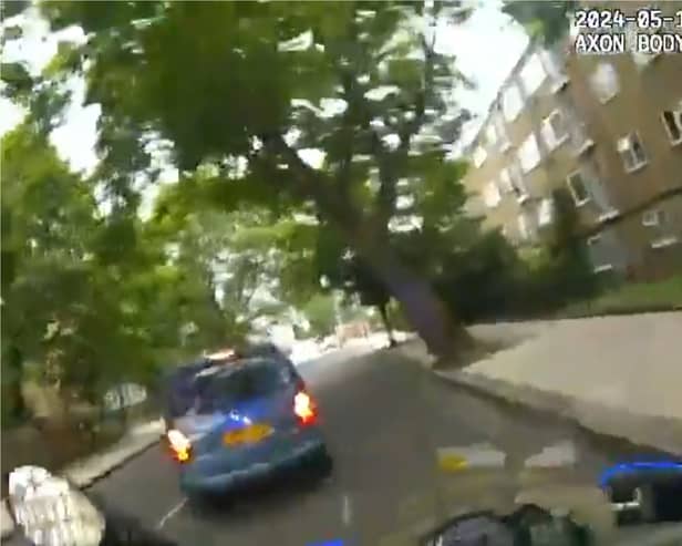 Thug rams police officer off his bike during high-speed pursuit.