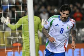 Italy's midfielder #08 Sandro Tonali celebrates scoring his team's first goal during the UEFA Nations League Group A2 football match between Belgium and Italy at the King Baudouin Stadium in Brussels on November 14, 2024. (Photo by NICOLAS TUCAT / AFP) (Photo by NICOLAS TUCAT/AFP via Getty Images)