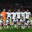 Lewis Hall (bottom left), Tino Livramento (second-bottom left) and Anthony Gordon (bottom right) pictured lining up for England