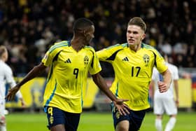 Alexander Isak of Sweden celebrates with Viktor Gyokeres after scoring his team's second goal (2-1) during the UEFA Nations League 2024/25 League C Group C1 match between Sweden and Slovakia at Strawberry Arena on November 16, 2024 in Solna, Sweden. (Photo by Michael Campanella/Getty Images)