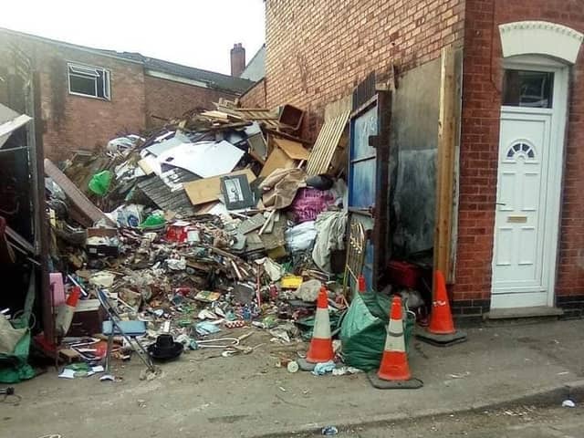 The huge mountain of rubbish has built up at a property in Dalkeith Street