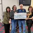 Committee members from Boldon Blossoms WI presenting a cheque to Gordon and Leanne at the Boldon Community Association Foodbank.