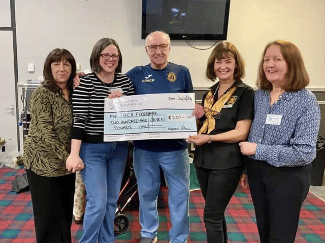 Committee members from Boldon Blossoms WI presenting a cheque to Gordon and Leanne at the Boldon Community Association Foodbank.