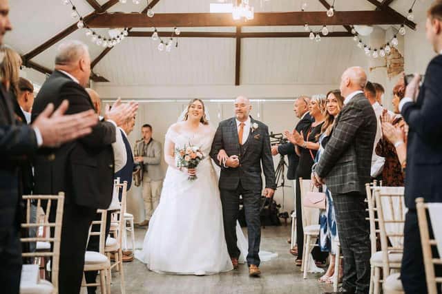 Martin Simpson was able to walk his daughter, Emily, down the aisle a day after having a stroke.