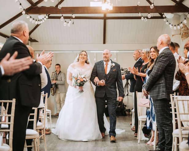 Martin Simpson was able to walk his daughter, Emily, down the aisle a day after having a stroke.