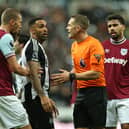 Craig Pawson waved away protests for a penalty during Newcastle United's defeat to West Ham on Monday night.