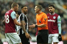 Craig Pawson waved away protests for a penalty during Newcastle United's defeat to West Ham on Monday night.