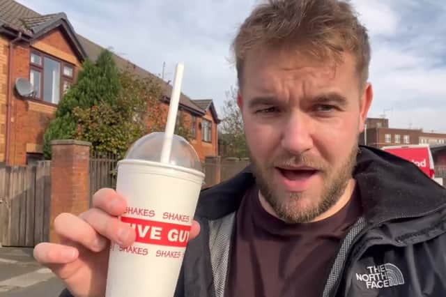 Reporter Jack Marshall trying the popcorn shake