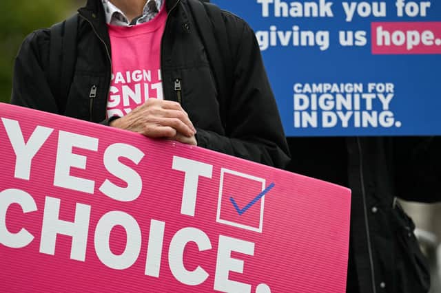 Campaigners for 'dignity in dying' hold a demonstration outside the Houses of Parliament (Picture: Justin Tallis)