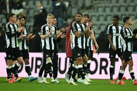 Newcastle United players after the 3-3 draw with Liverpool. 