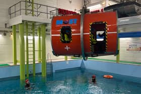 Volunteers from Mountain Rescue Search Dogs England have taken part in essential underwater helicopter escape training at South Shields Marine School.