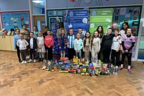 Pupils at West Boldon Primary School with their donations from their 'Boldon in Need' non-uniform day.