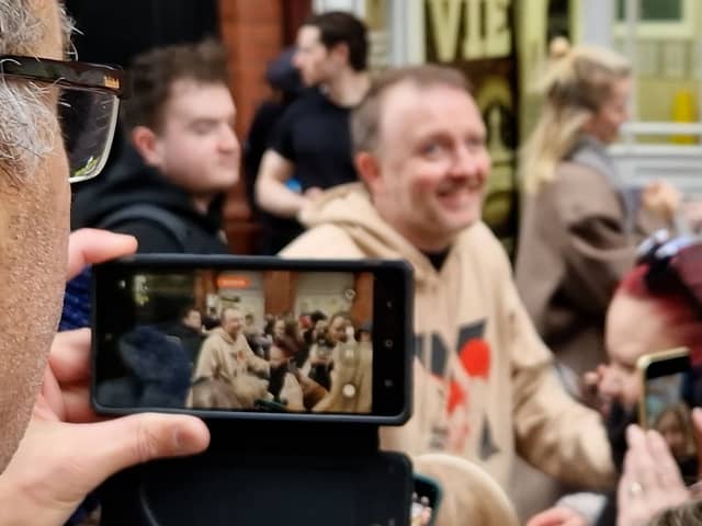Chris McCausland poses for selfies outside Blackpool Tower during Strictly Come Dancing visit.