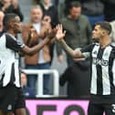 Alexander Isak of Newcastle United celebrates scoring his team's second goal with teammate Bruno Guimaraes during the Premier League match between Newcastle United FC and Tottenham Hotspur FC at St James' Park on September 01, 2024 in Newcastle upon Tyne, England. (Photo by Matt McNulty/Getty Images)