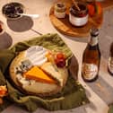 The board is coated in grains left over from the brewing process and is sourced from a dairy local to the brewery in the Italian Alps