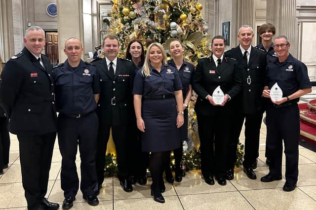 Representatives from TWFRS with the two awards.