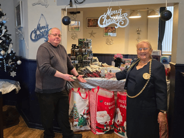 Dave Wood and Cllr Fay Cunningham, Mayor of South Tyneside, with the Christmas gift donations at the New Lookout pub.