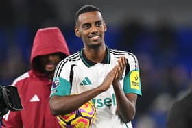 Alexander Isak of Newcastle United celebrates with the match ball after scoring a hat-trick after the Premier League match between Ipswich Town FC and Newcastle United FC at Portman Road on December 21, 2024 in Ipswich, England. (Photo by Michael Regan/Getty Images)