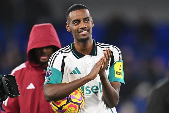 Alexander Isak of Newcastle United celebrates with the match ball after scoring a hat-trick after the Premier League match between Ipswich Town FC and Newcastle United FC at Portman Road on December 21, 2024 in Ipswich, England. (Photo by Michael Regan/Getty Images)