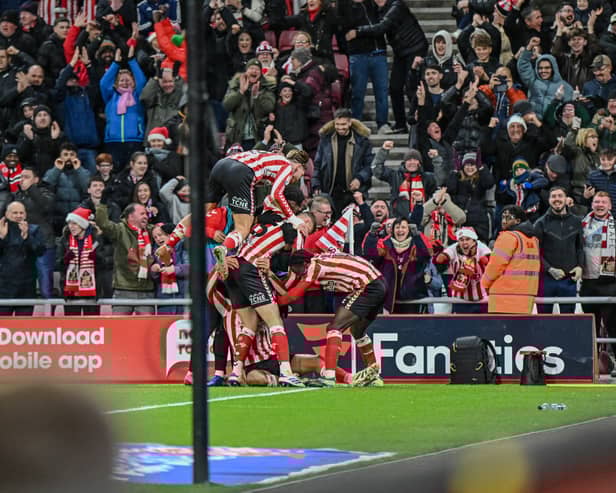 Sunderland's players celebrate at the Stadium of Light. Photo by Chris Fryatt