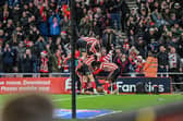 Sunderland's players celebrate at the Stadium of Light. Photo by Chris Fryatt