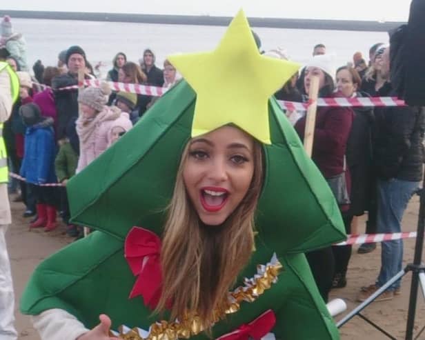 Jade gets into the Christmas spirit for the 2014 Cancer Connections Boxing Day dip in South Shields.