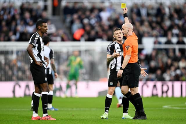 Kieran Trippier is booked against Aston Villa. 