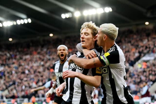 Anthony Gordon celebrates scoring for Newcastle United. 