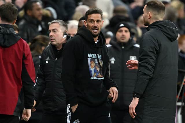 Jason Tindall, Assistant Manager of Newcastle United wears a 'Wham - Last Christmas' hoodie following the Premier League match between Newcastle United FC and Aston Villa FC at St James' Park on December 26, 2024 in Newcastle upon Tyne, England. (Photo by Stu Forster/Getty Images)